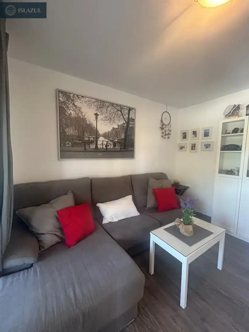 Sala d'estar de Apartament en venda en Isla Cristina amb Aire condicionat, Jardí privat i Terrassa