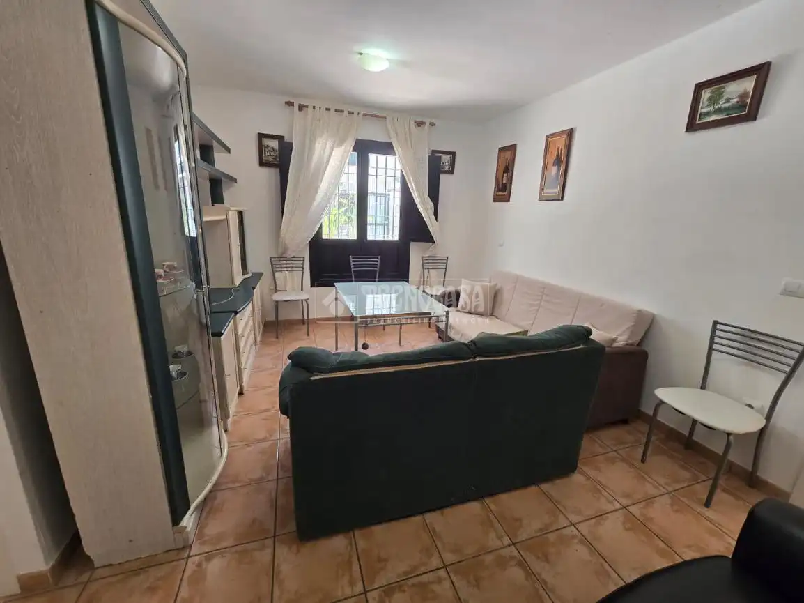 Sala de estar de Piso en venta en Vélez de Benaudalla con Aire acondicionado, Terraza y Piscina comunitaria