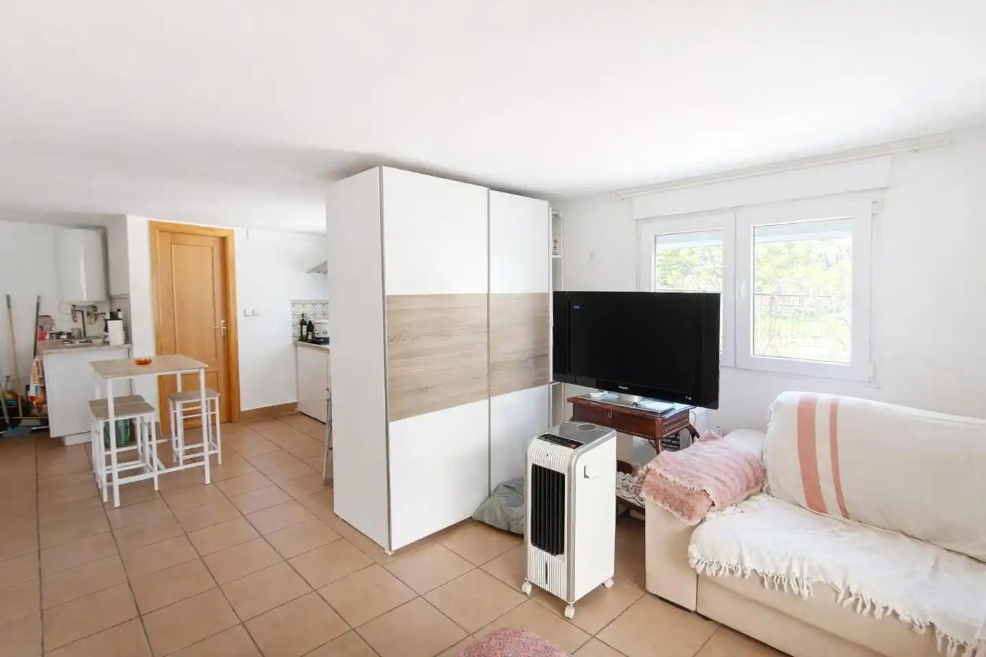 Sala d'estar de Apartament en venda en Oliva amb Aire condicionat, Terrassa i Traster