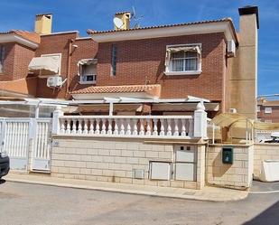 Vista exterior de Casa adosada en venda en Santa Pola amb Terrassa i Piscina comunitària