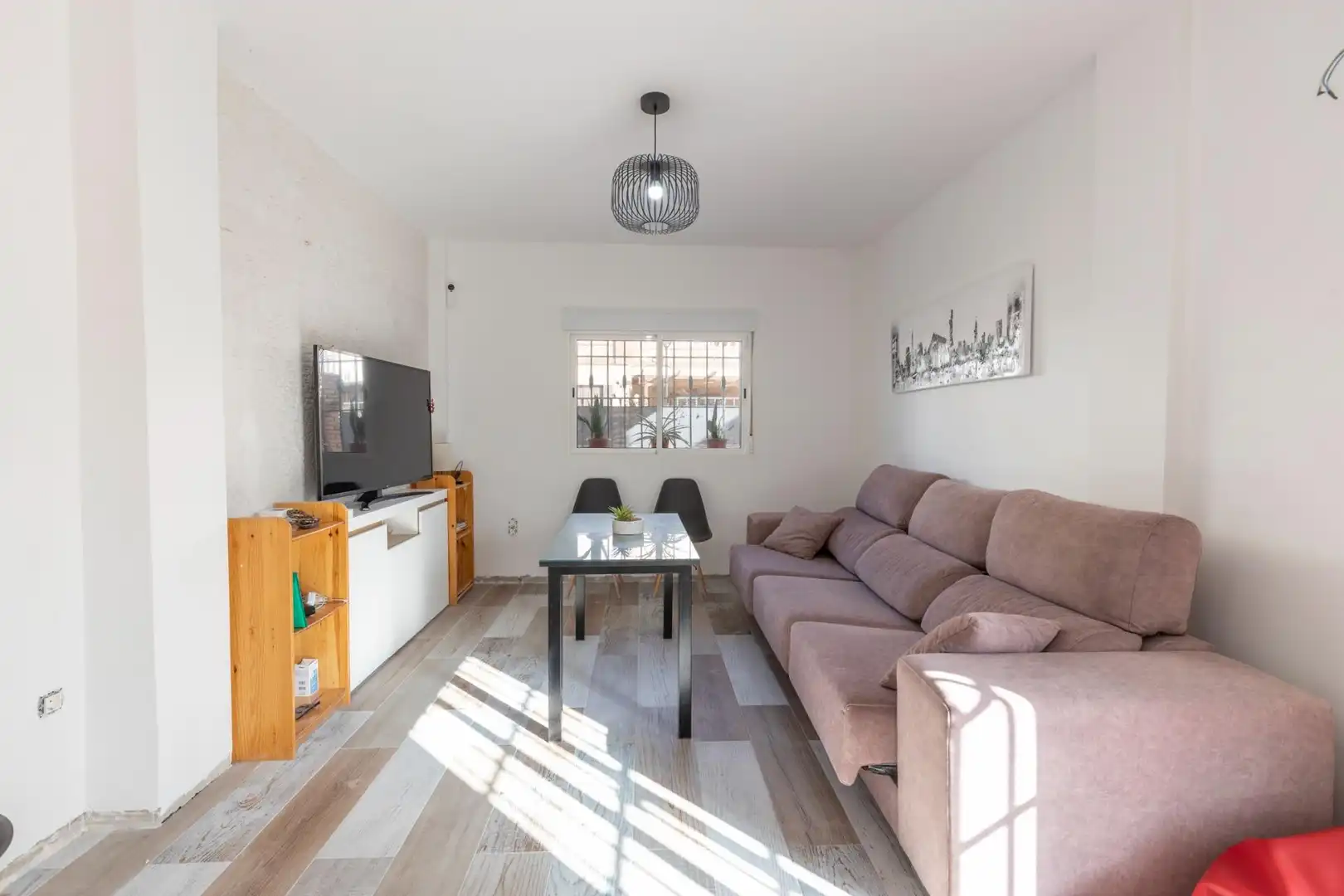 Sala d'estar de Casa adosada en venda en La Malahá amb Terrassa