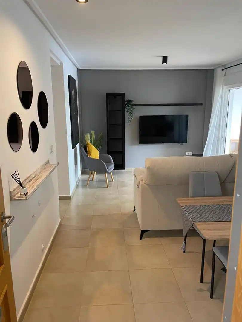 Sala d'estar de Apartament de lloguer en Torre-Pacheco amb Aire condicionat, Piscina i Moblat