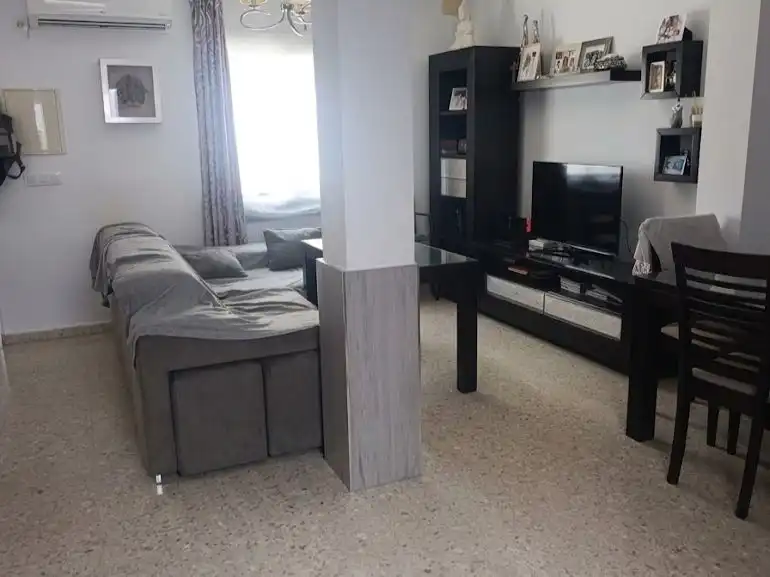 Sala d'estar de Casa o xalet en venda en Palma del Río amb Aire condicionat, Terrassa i Balcó