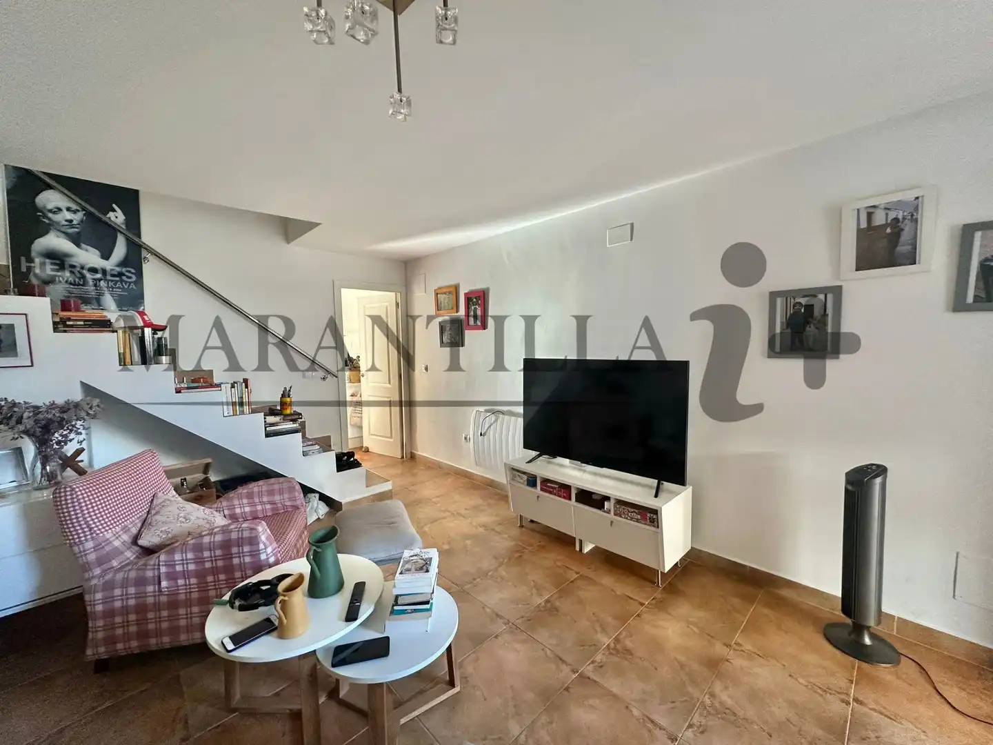 Sala d'estar de Casa adosada en venda en La Antilla amb Aire condicionat, Terrassa i Traster