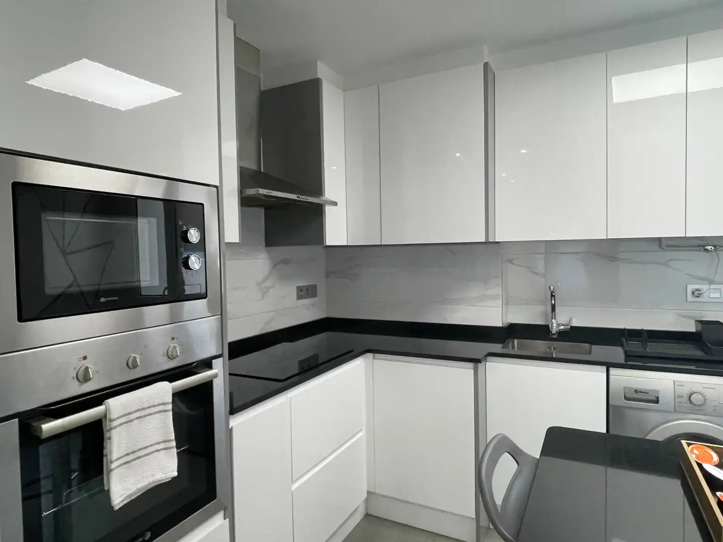 Kitchen of Flat for rent in Gijón   with Heating, Terrace and Furnished