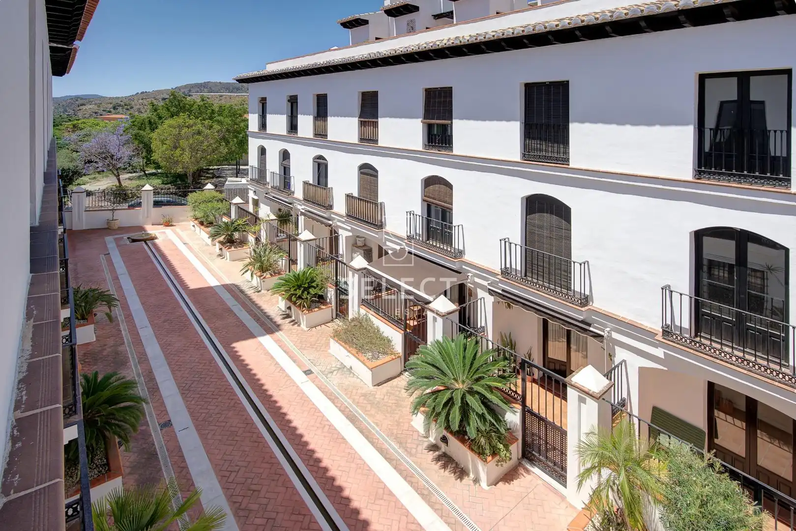 Außenansicht von Wohnungen zum Verkauf in Vélez de Benaudalla mit Klimaanlage, Privatgarten und Terrasse