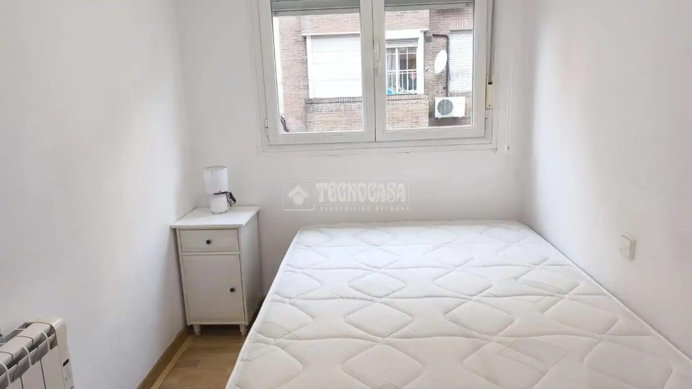 Schlafzimmer von Wohnung zum Verkauf in Madrid mit Klimaanlage und Balkon