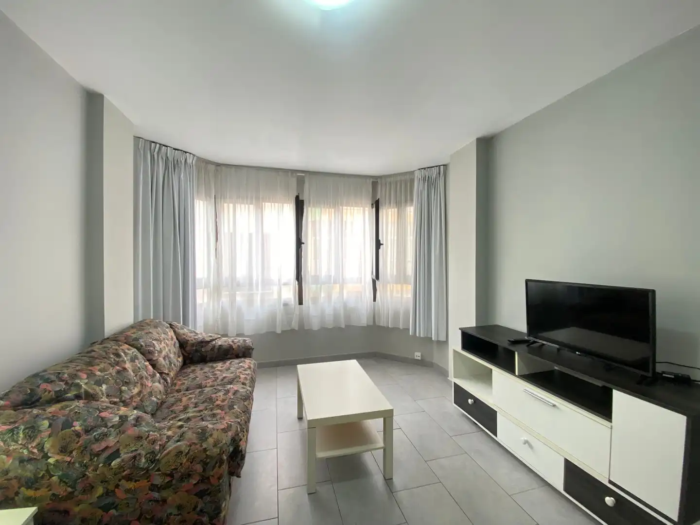 Sala d'estar de Pis de lloguer en Las Palmas de Gran Canaria amb Moblat