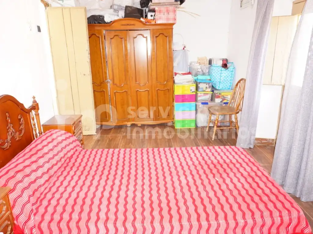 Habitación de Casa adosada en venta en Benamocarra con Jardín privado, Terraza y Amueblado
