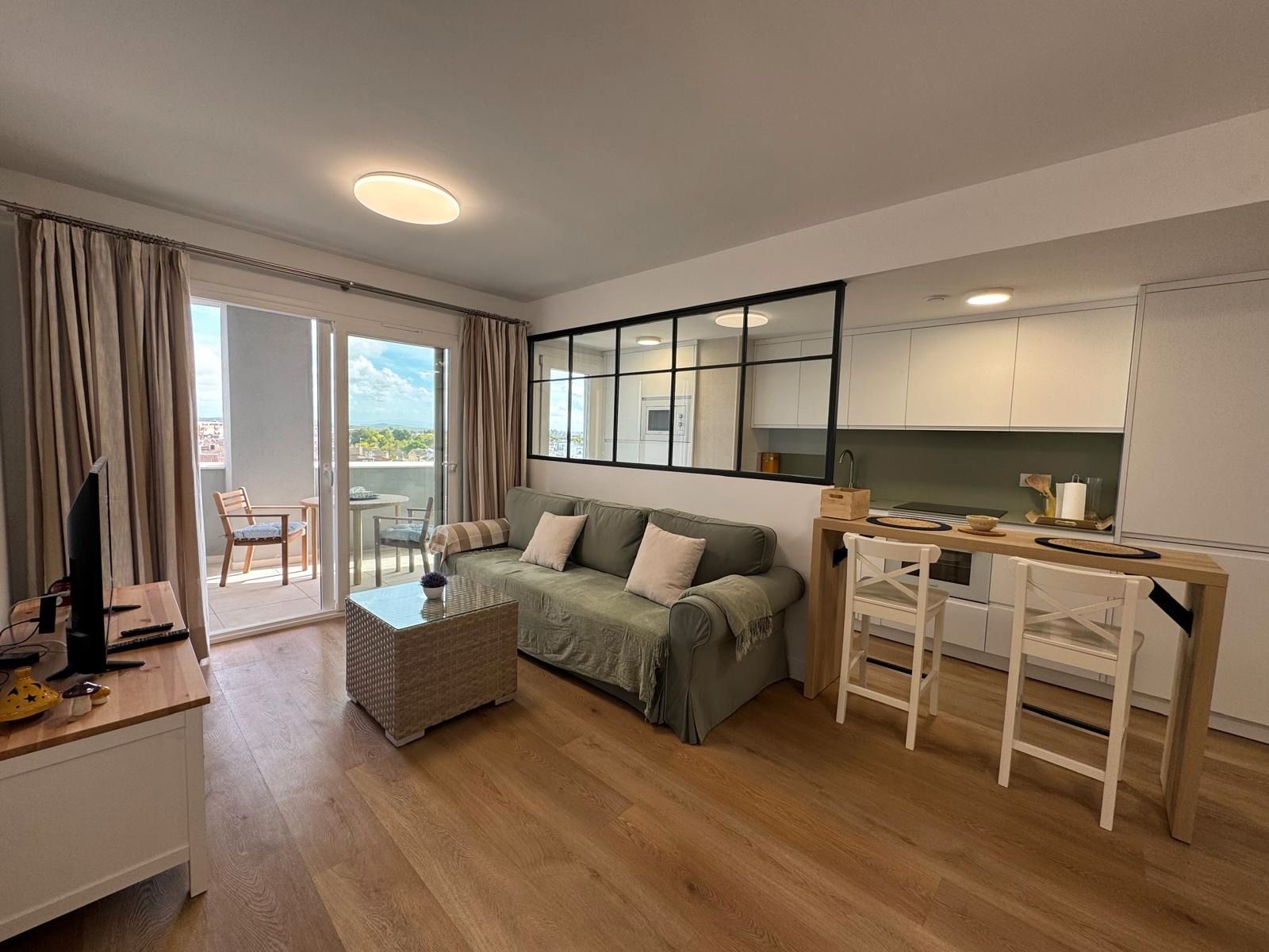 Sala d'estar de Pis de lloguer en Jerez de la Frontera amb Aire condicionat, Terrassa i Piscina comunitària