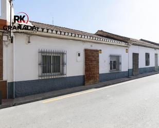 Vista exterior de Casa adosada en venda en Churriana de la Vega amb Calefacció