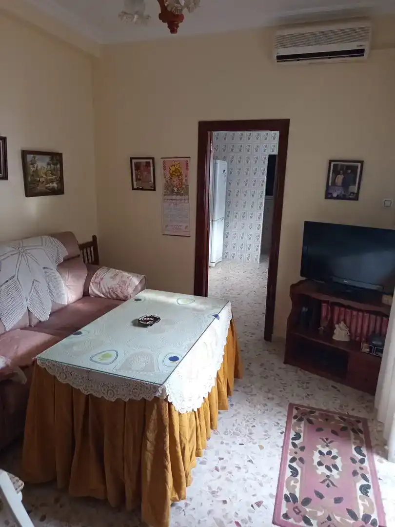 Sala d'estar de Casa o xalet en venda en Dos Hermanas amb Aire condicionat i Balcó