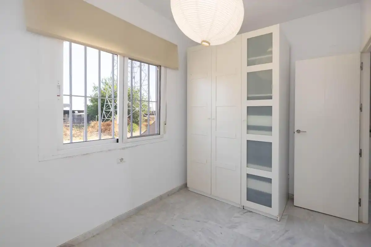 Habitación de Casa adosada en venta en Valencina de la Concepción con Aire acondicionado, Calefacción y Terraza