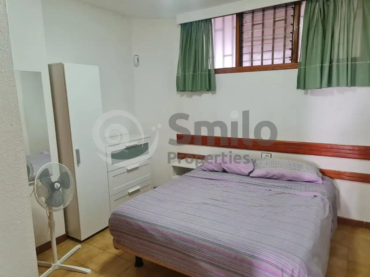 Schlafzimmer von Erdgeschoss zur Miete in Arona mit Möbliert und Gemeinschaftspool