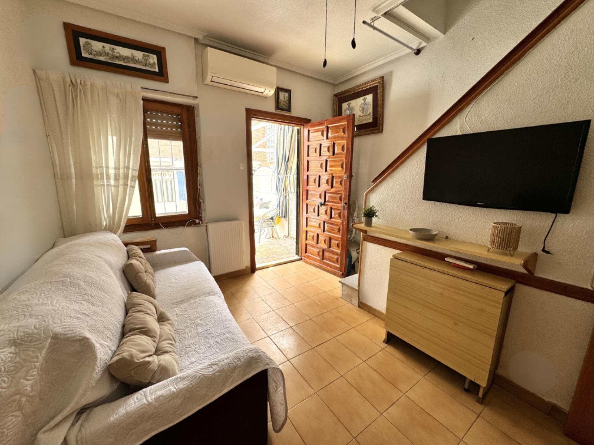 Sala d'estar de Casa o xalet en venda en Santa Pola amb Aire condicionat, Terrassa i Balcó