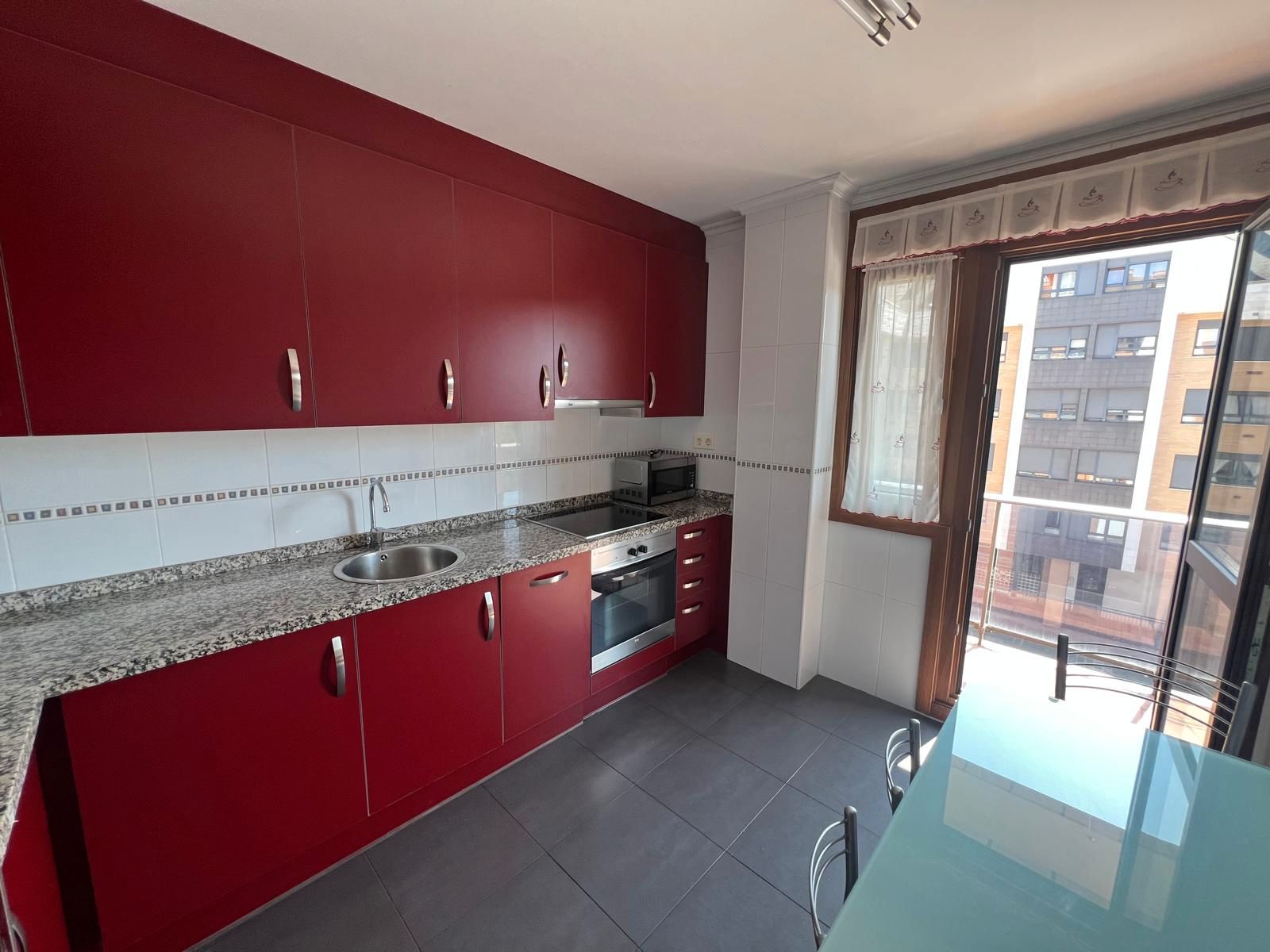 Kitchen of Flat to rent in Gijón   with Heating, Terrace and Furnished