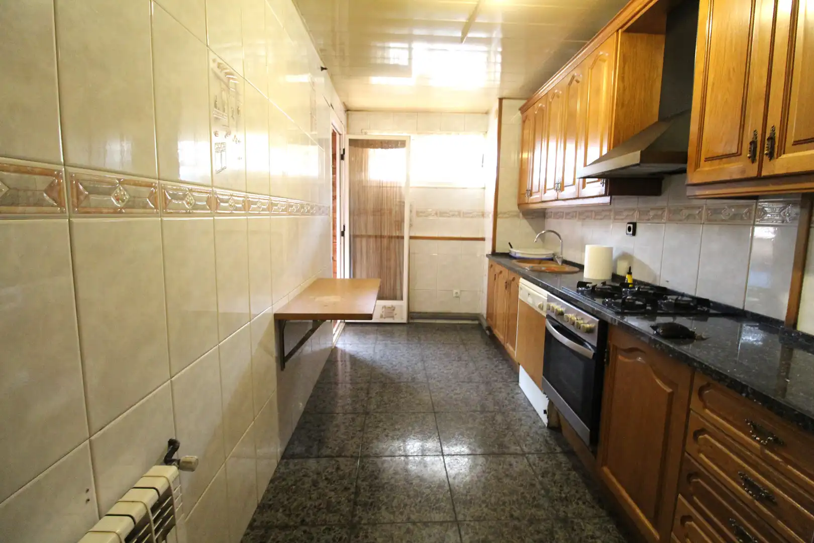 Cuina de Pis en venda en Sabadell amb Forn i Balcó