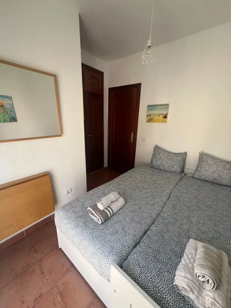 Habitación de Casa adosada en venta en Islantilla con Jardín privado, Trastero y Piscina comunitaria