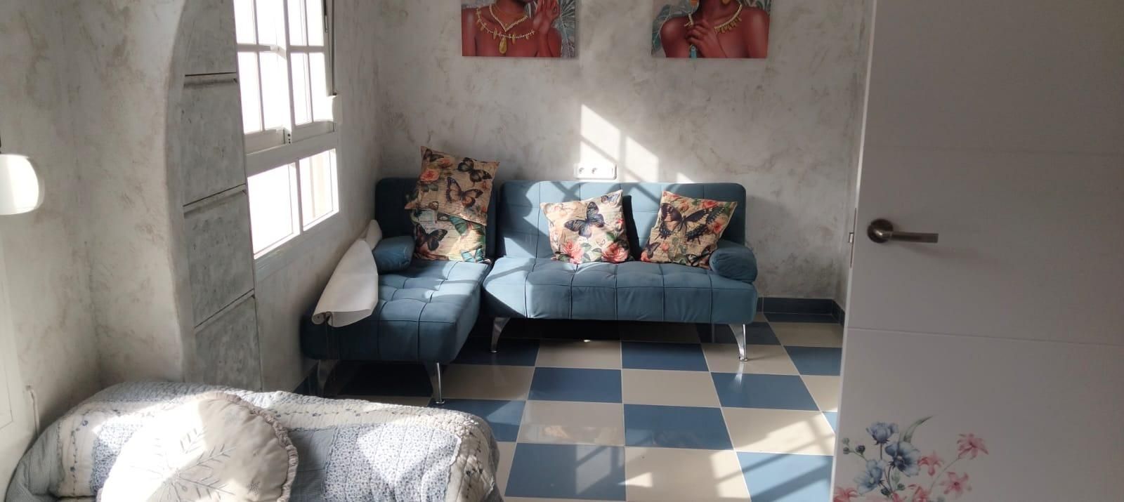 Sala d'estar de Casa adosada en venda en L'Alfàs del Pi amb Aire condicionat, Terrassa i Piscina comunitària