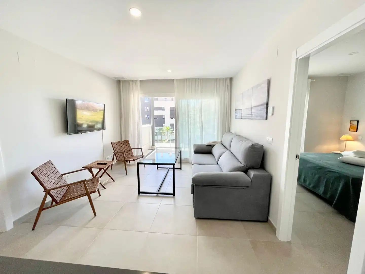 Sala d'estar de Apartament de lloguer en Ayamonte amb Aire condicionat, Calefacció i Jardí privat
