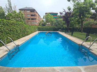 Swimming pool of Flat for sale in  Madrid Capital  with Heating, Private garden and Terrace