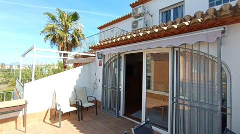 Foto 2 de Casa adosada en venta en Oliva Nova, Oliva