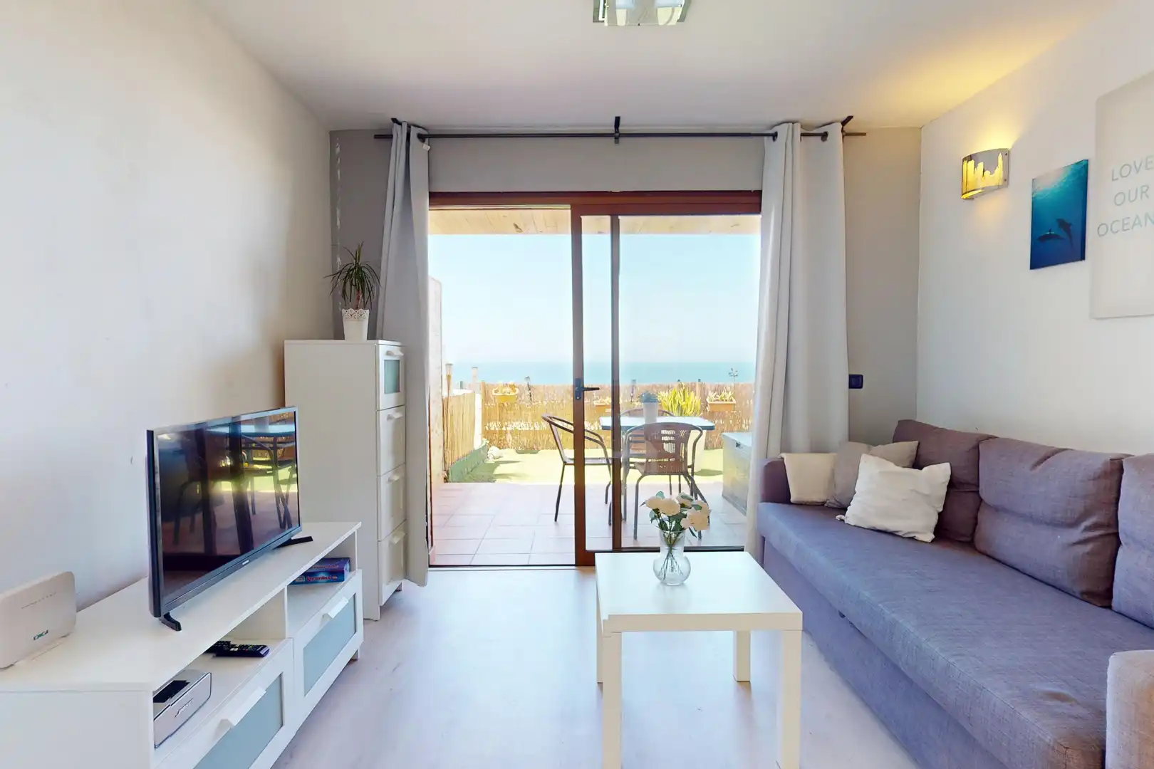Living room of Flat for sale in Mogán  with Air Conditioner, Heating and Terrace