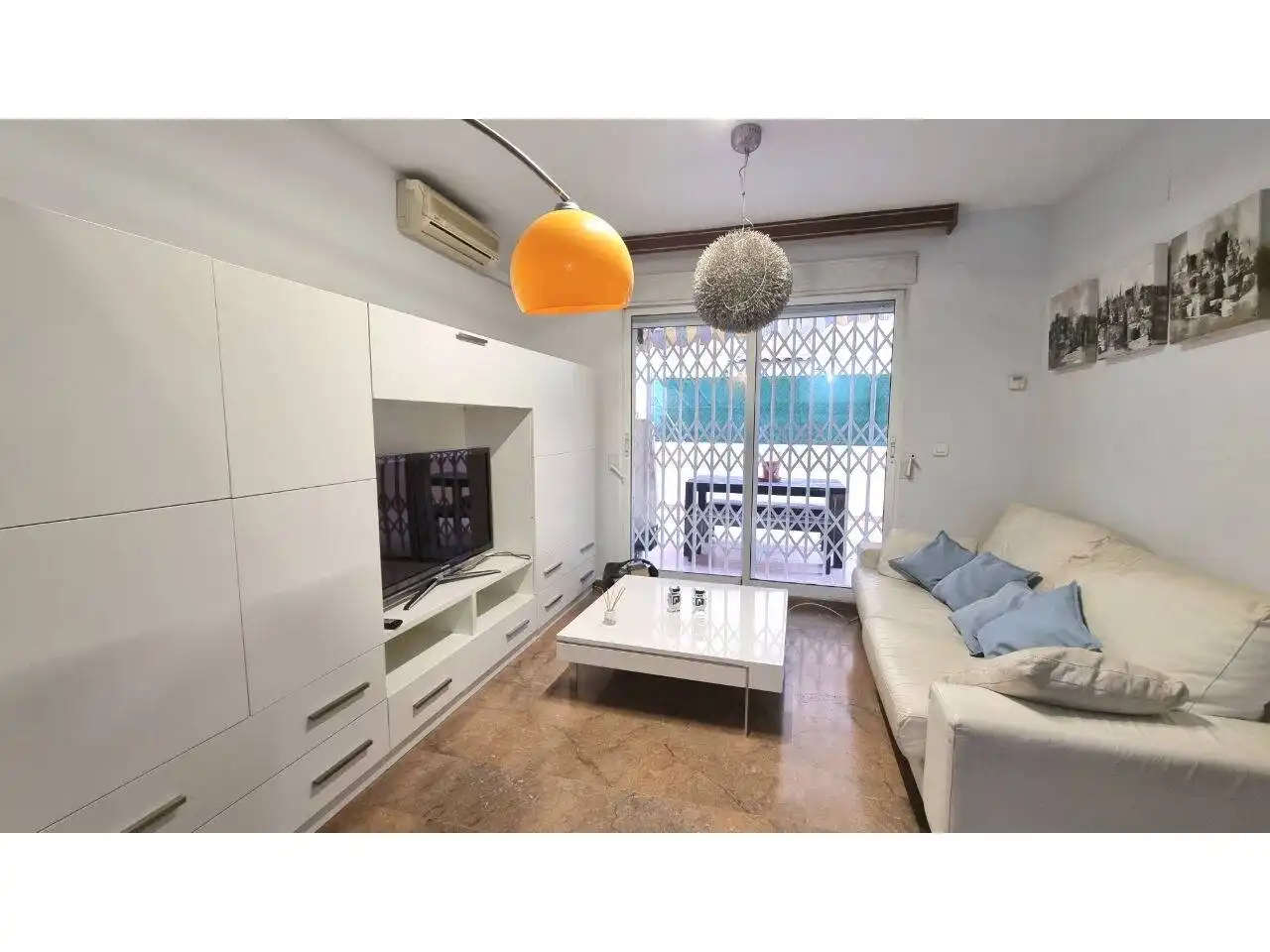 Sala d'estar de Casa adosada en venda en Puçol amb Aire condicionat, Calefacció i Terrassa