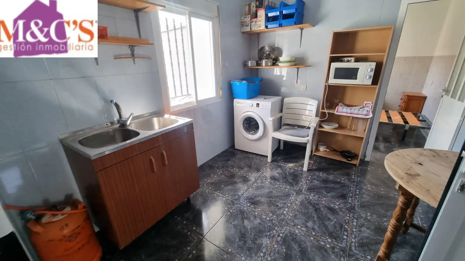 Cuina de Casa o xalet en venda en Villanueva de San Carlos amb Jardí privat i Moblat