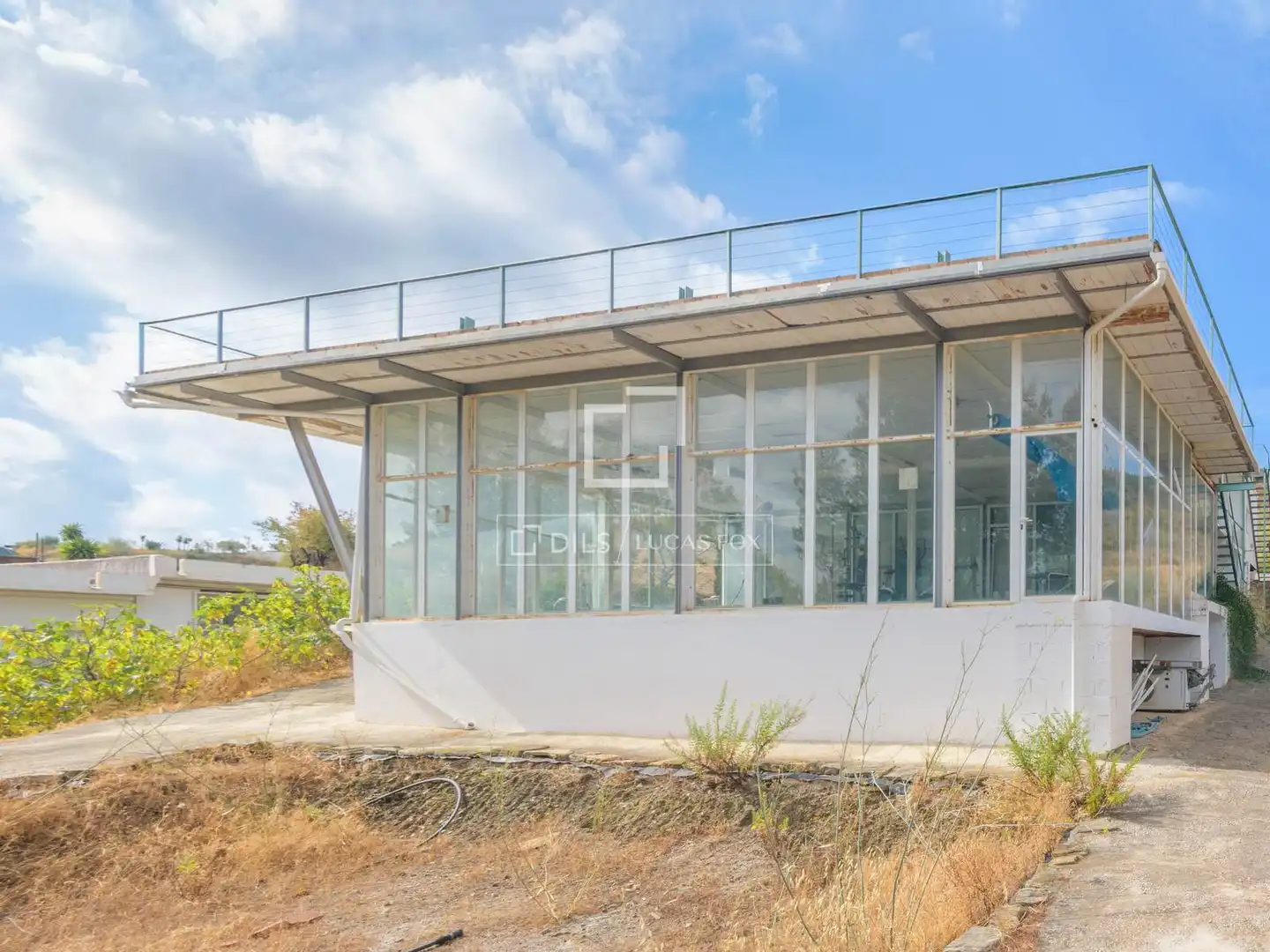 Vista exterior de Finca rústica en venda en Viñuela amb Jardí privat i Piscina
