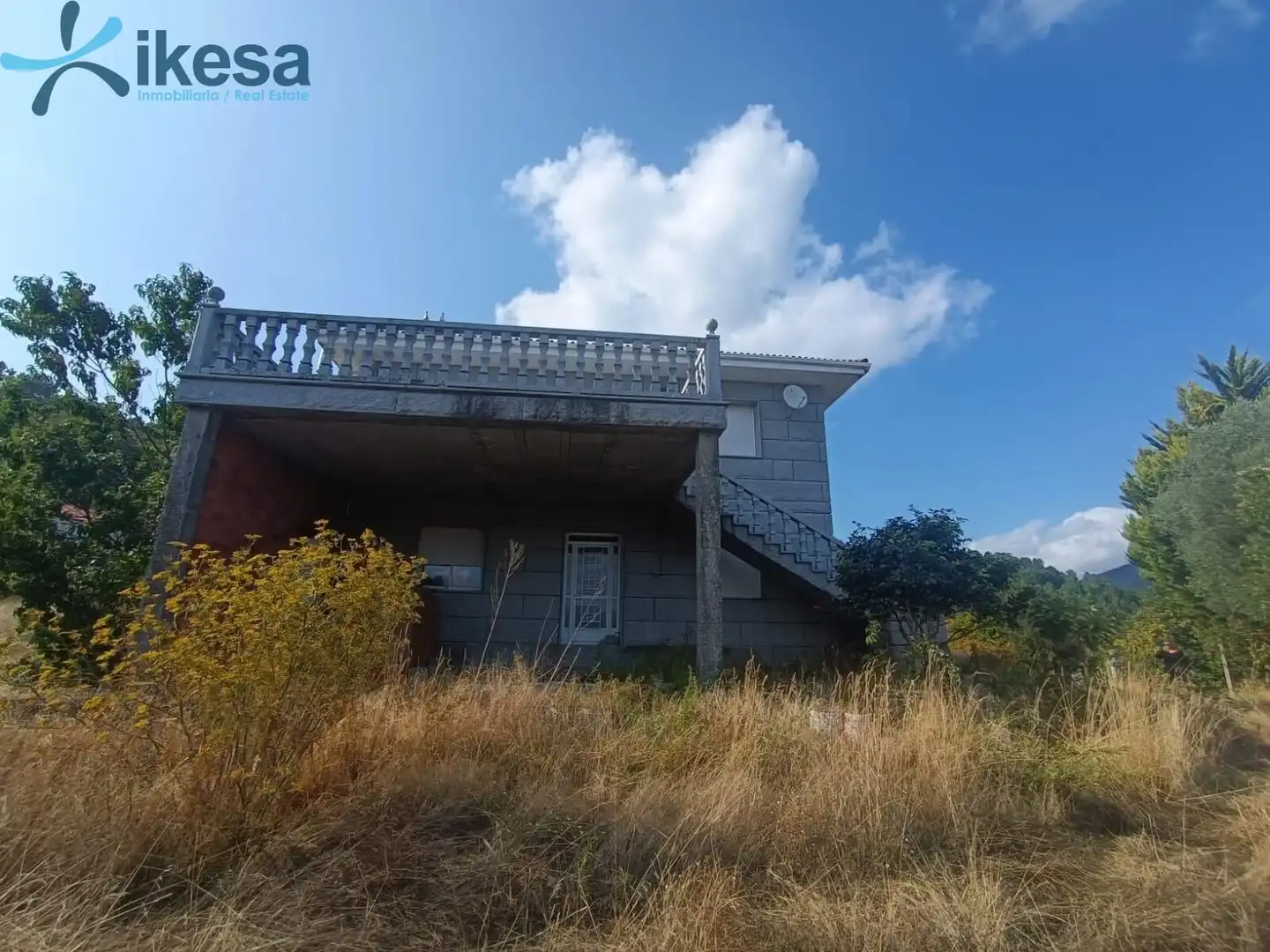 Vista exterior de Casa o xalet en venda en Entrimo amb Jardí privat