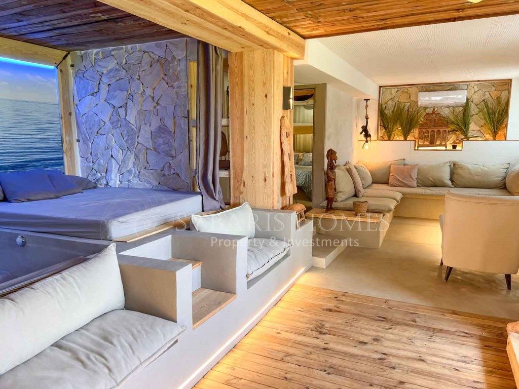 Sala d'estar de Apartament en venda en Dénia amb Aire condicionat, Jardí privat i Terrassa