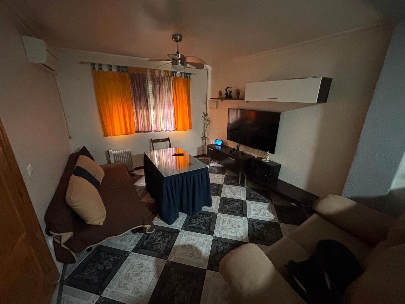 Living room of House or chalet for sale in  Sevilla Capital  with Air Conditioner, Terrace and Storage room