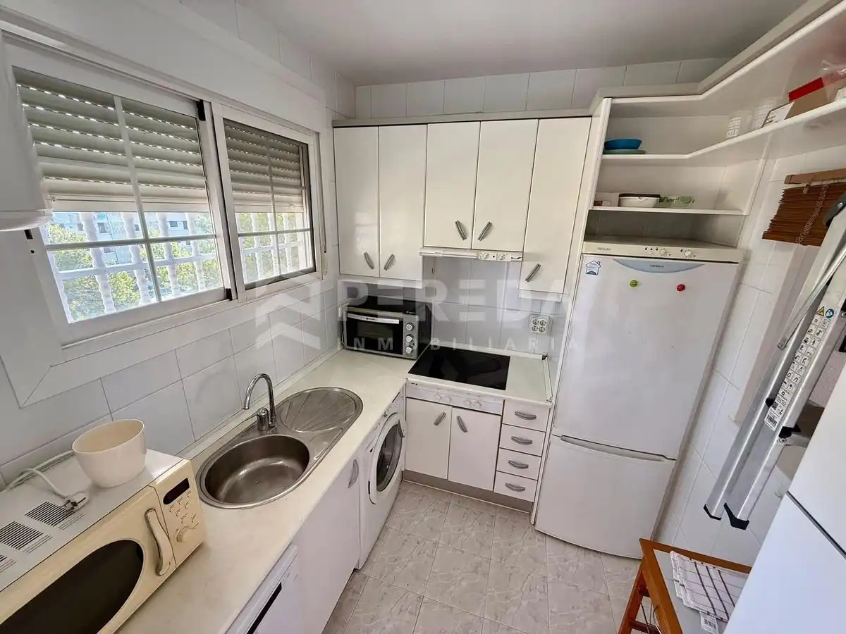 Cocina de Apartamento en venta en Roquetas de Mar con Aire acondicionado, Jardín privado y Amueblado