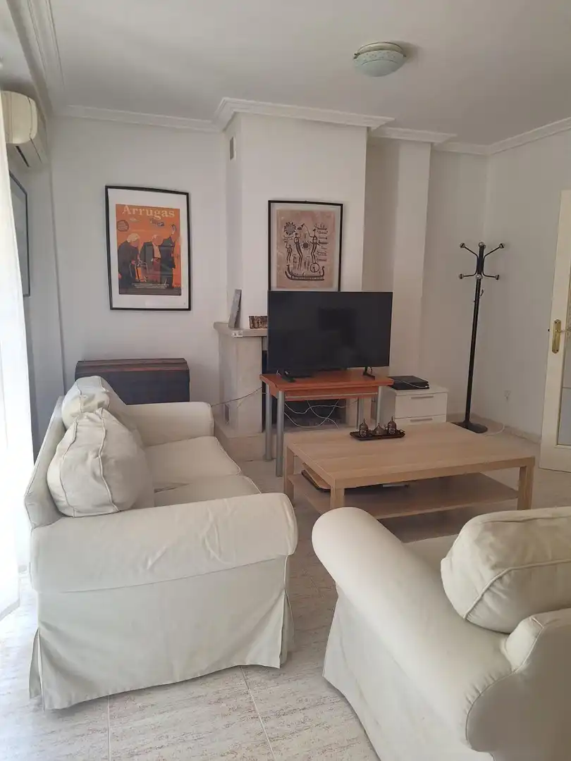 Sala d'estar de Casa adosada de lloguer en Murcia amb Aire condicionat, Terrassa i Moblat