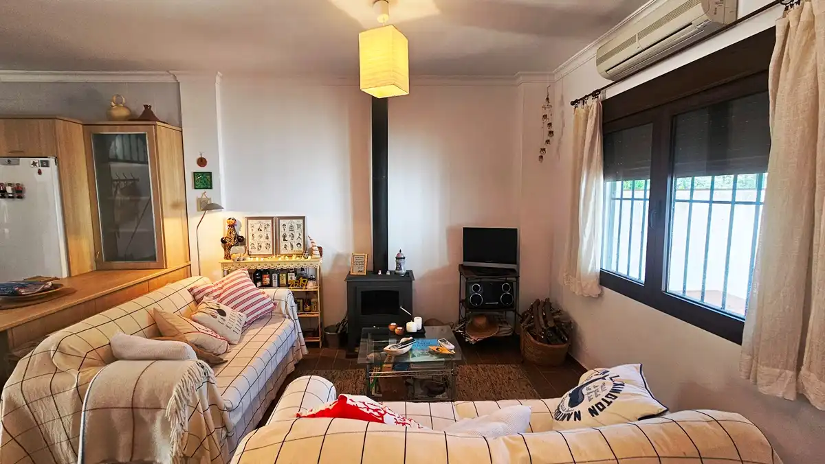 Sala de estar de Casa adosada en venta en Aroche con Aire acondicionado, Jardín privado y Amueblado
