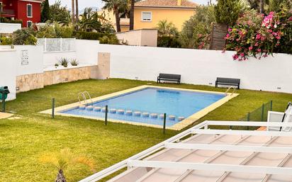 Swimming pool of Single-family semi-detached for sale in Dénia  with Air Conditioner, Terrace and Swimming Pool