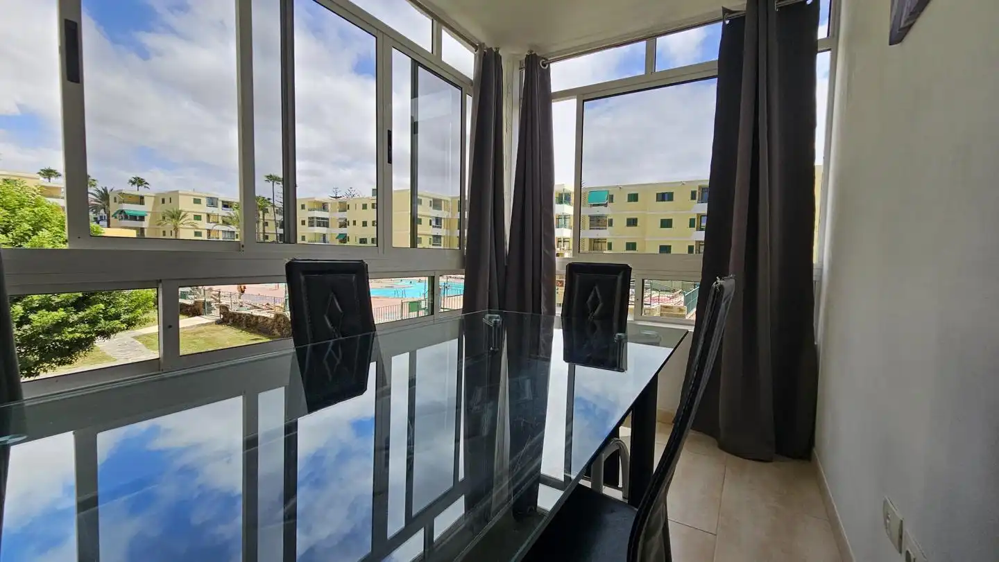 Dining room of Flat for sale in San Bartolomé de Tirajana  with Air Conditioner, Furnished and Community pool