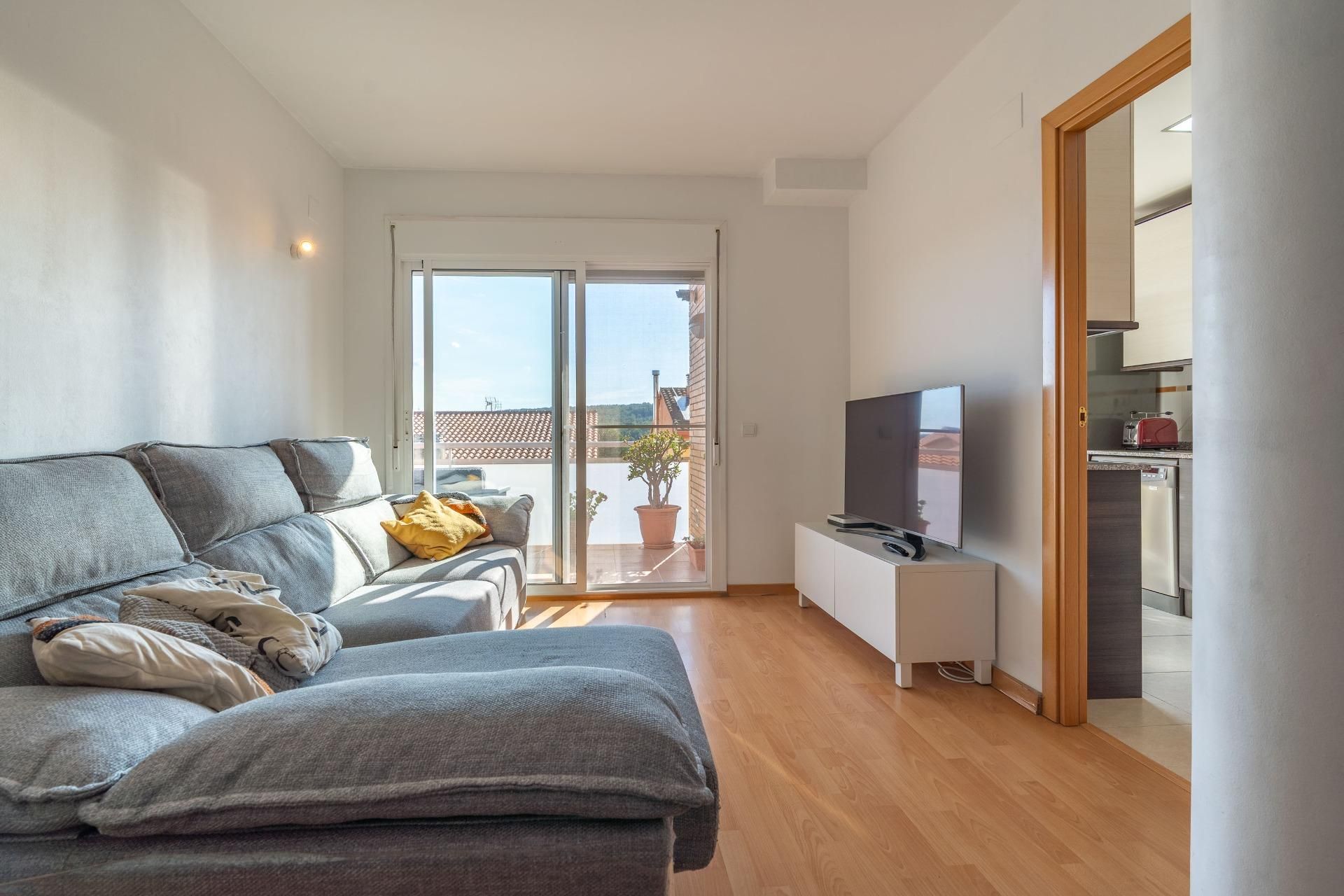 Sala d'estar de Dúplex en venda en Perafort amb Aire condicionat, Calefacció i Jardí privat