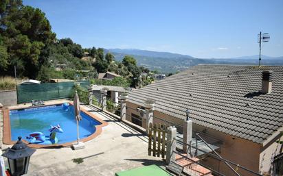 Swimming pool of House or chalet for sale in Bigues i Riells  with Air Conditioner, Private garden and Terrace