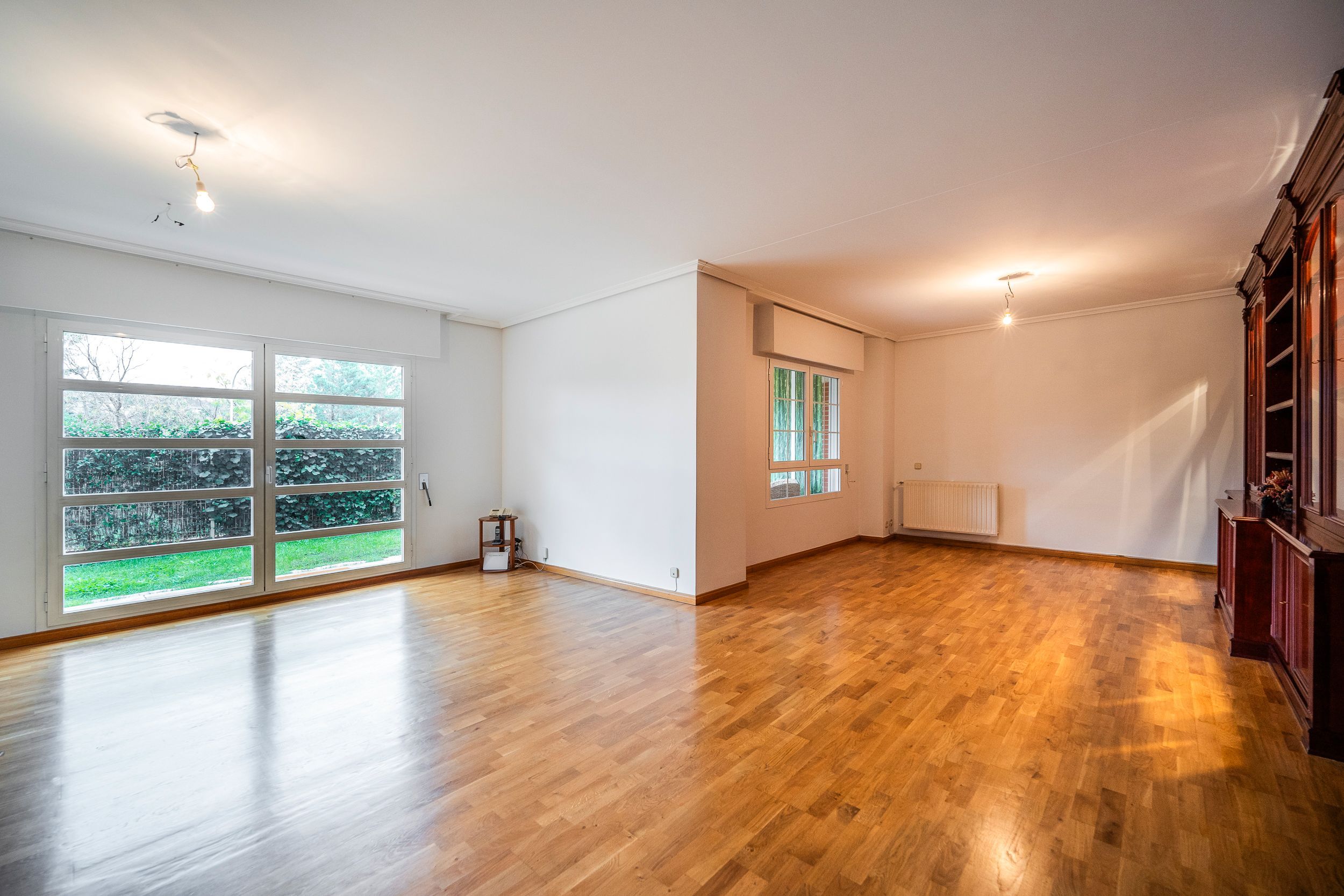 Living room of Planta baja for sale in  Madrid Capital  with Air Conditioner, Heating and Private garden