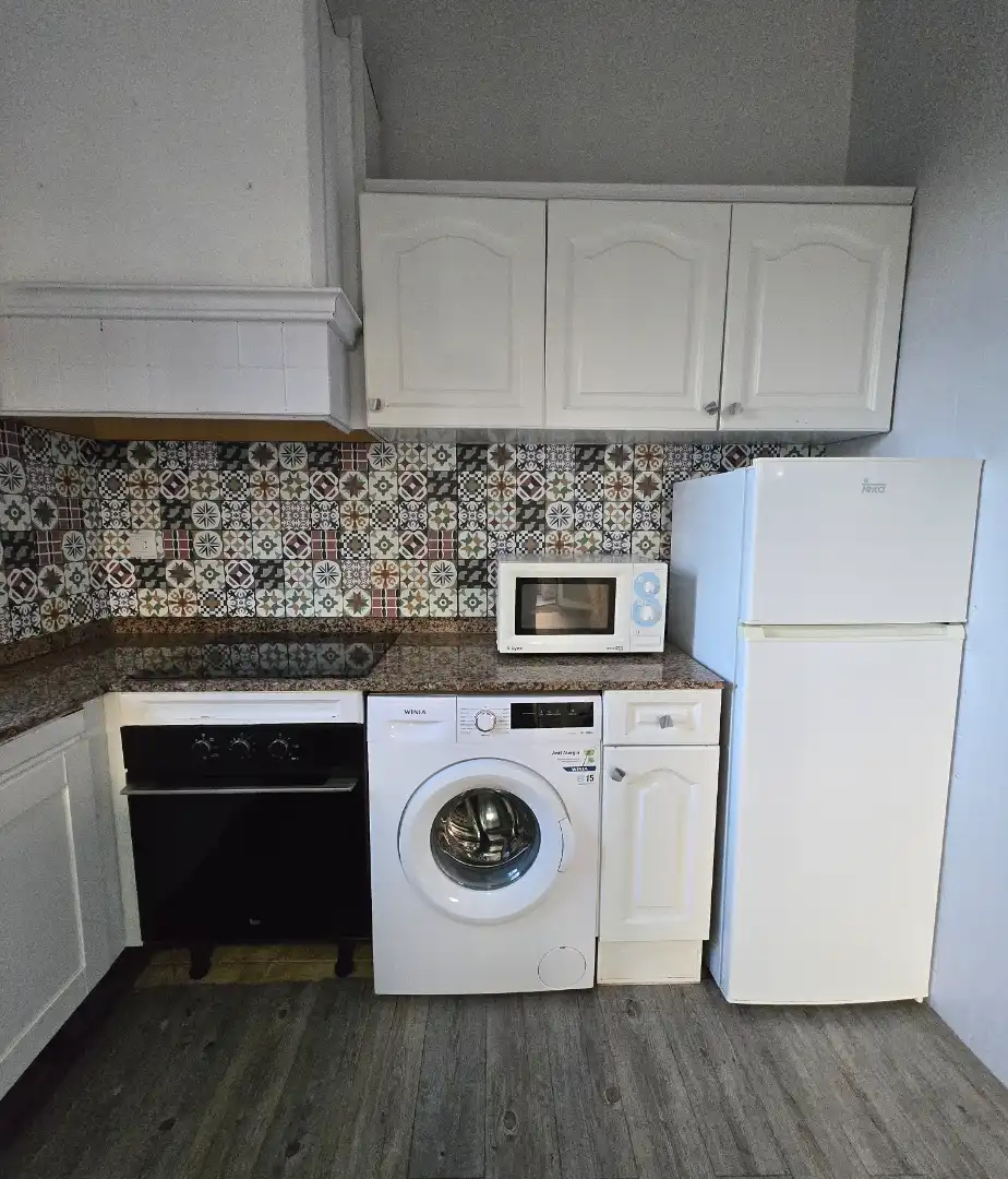 Küche von Einfamilien-Reihenhaus zum Verkauf in Cambrils mit Privatgarten, Ofen und Gemeinschaftspool