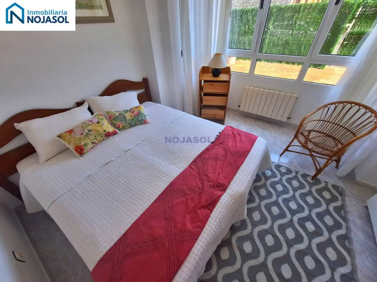 Dormitori de Apartament de lloguer en Noja amb Calefacció, Jardí privat i Terrassa