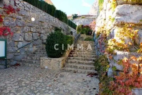 Vista exterior de Casa adosada en venda en Polop amb Calefacció, Jardí privat i Terrassa