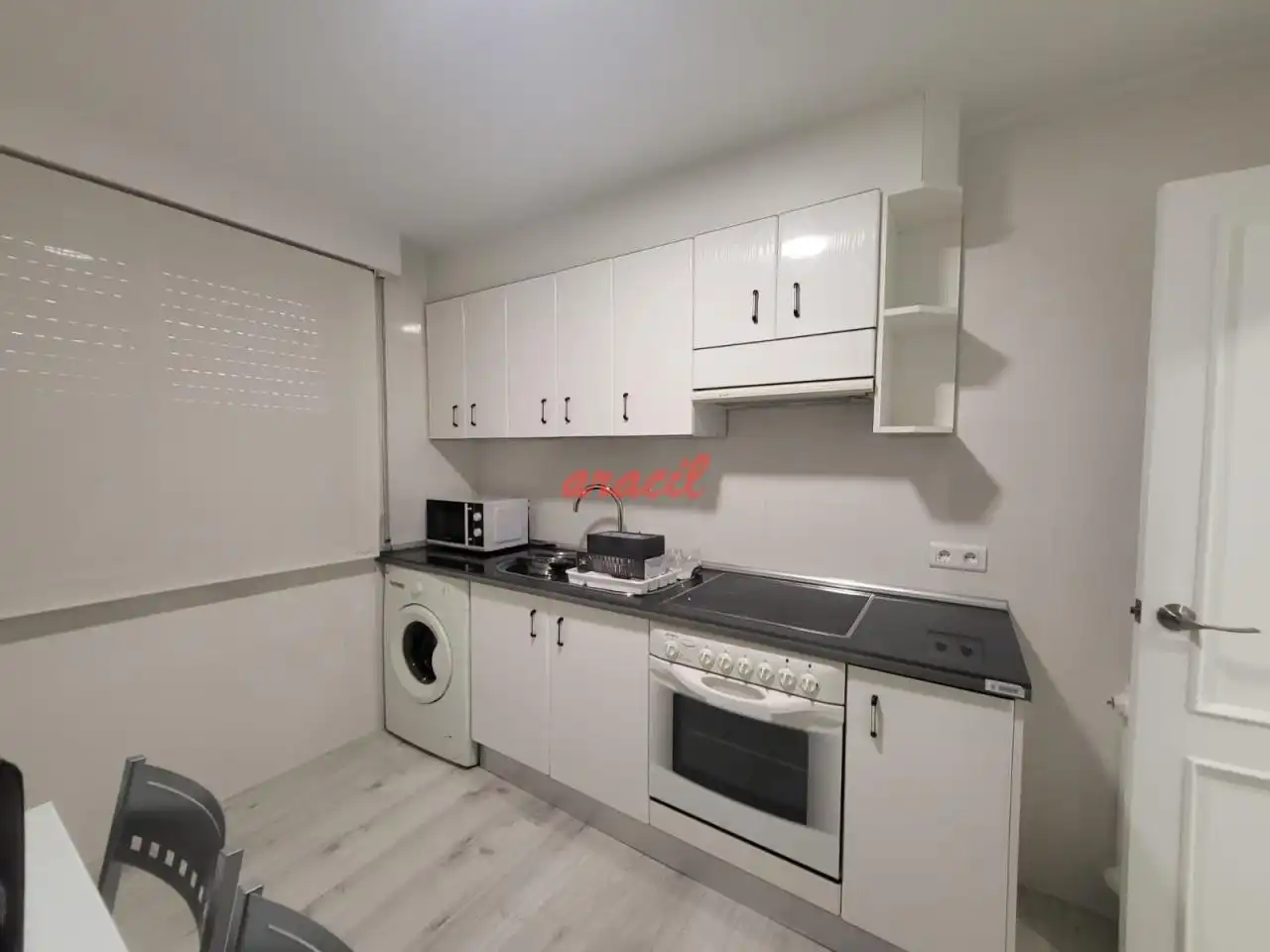 Kitchen of Flat for share in Ourense Capital   with Heating, Furnished and Balcony