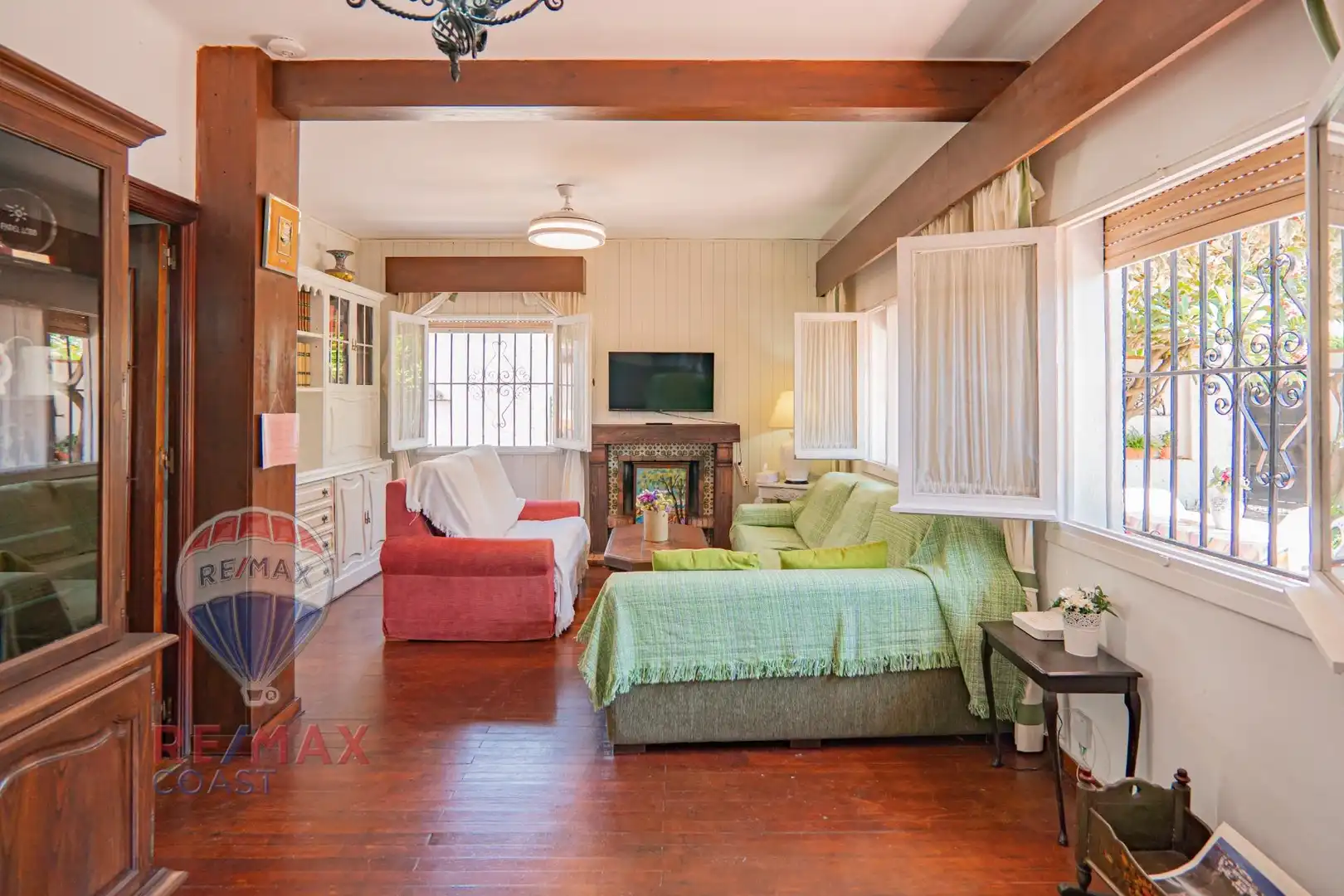Sala de estar de Casa adosada en venta en Málaga con Aire acondicionado, Jardín privado y Terraza