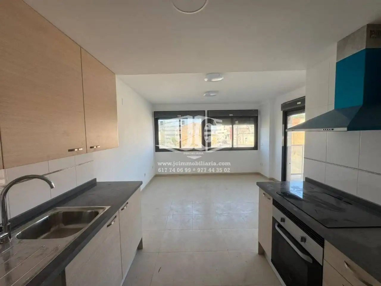 Kitchen of Flat for rent in L'Aldea  with Air Conditioner, Terrace and Storage room