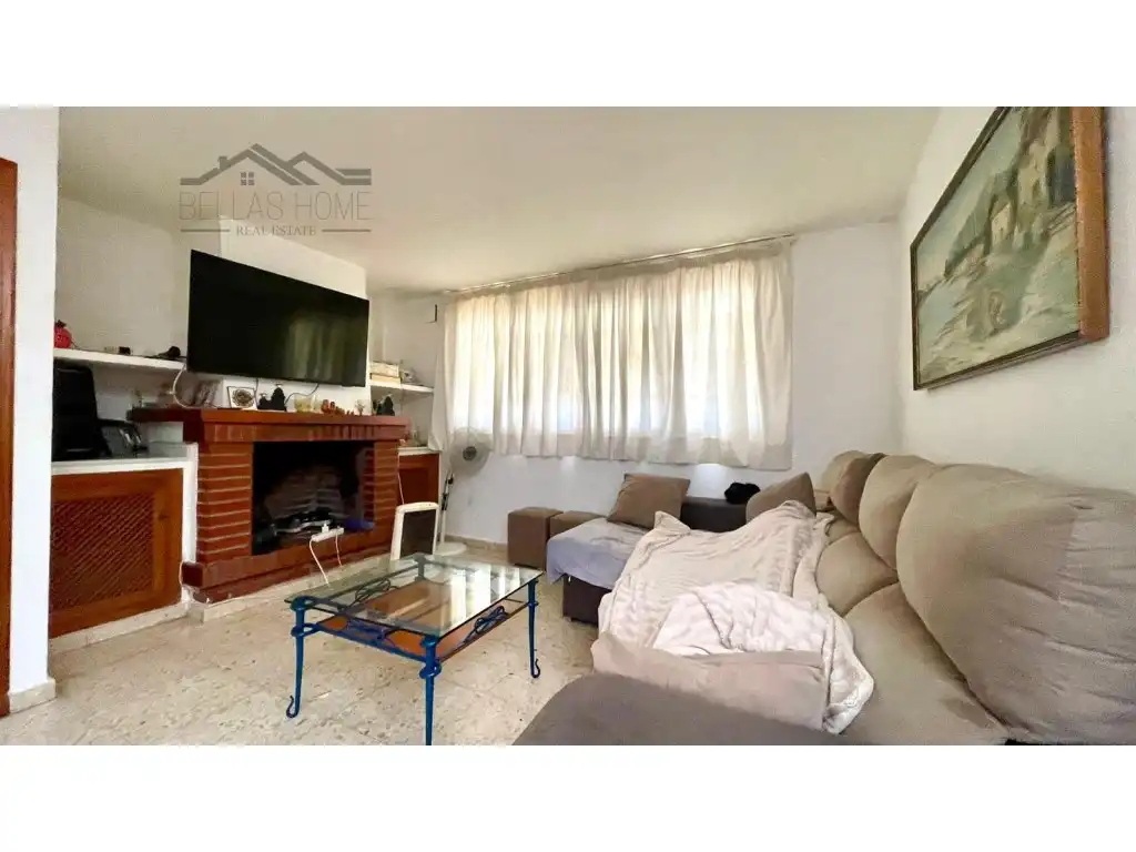 Sala d'estar de Casa adosada en venda en Estepona amb Aire condicionat