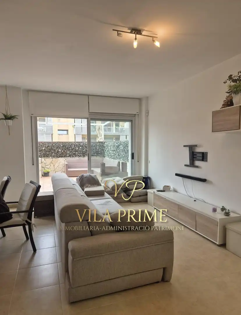 Sala d'estar de Dúplex en venda en Sant Feliu de Guíxols amb Aire condicionat, Calefacció i Jardí privat