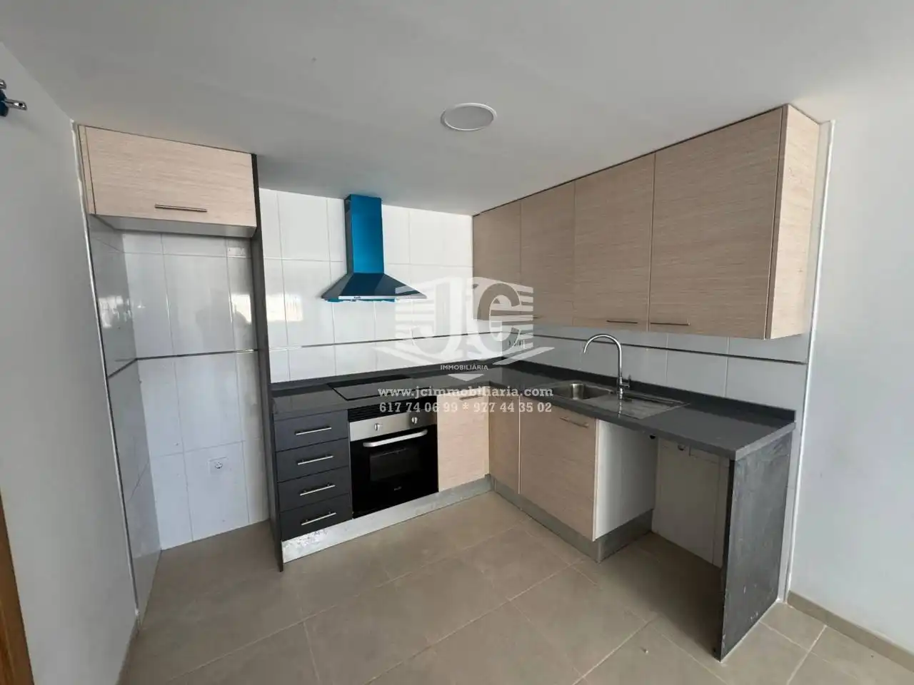 Kitchen of Flat for rent in L'Aldea  with Air Conditioner, Terrace and Storage room